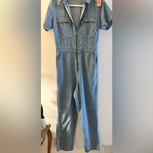 Topshop is a store the TV star often heads to. denim jumpsuit, - Picture 7 of 8